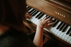 woman playing the piano