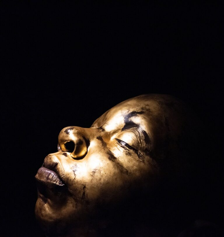 dark background and gold face